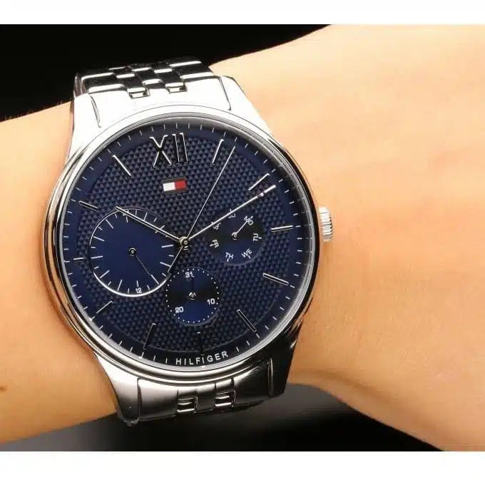 Tommy Hilfiger 1791416 Damon Men’s Watch – Blue Dial, Silver Stainless Steel Bracelet, Day & Date Display, Quartz Movement