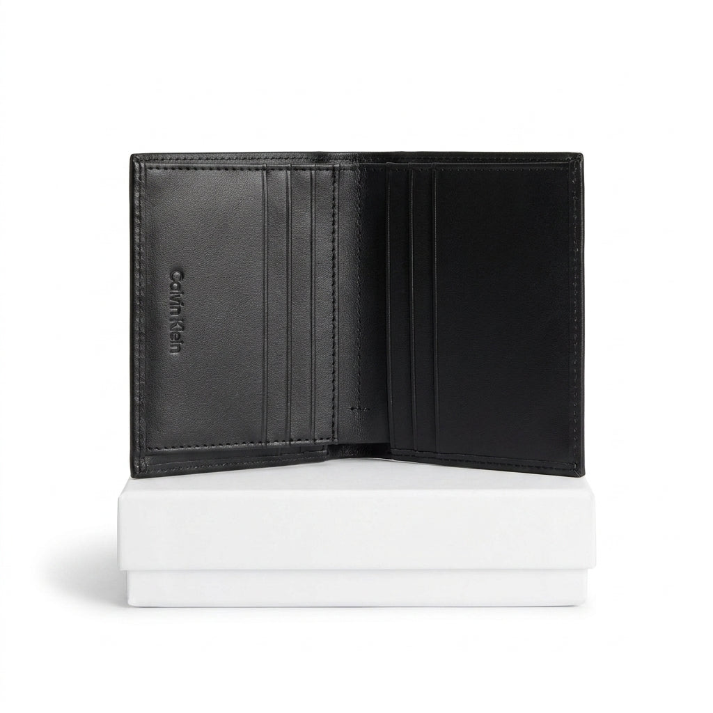 Calvin Klein Men's Premium Black Leather Wallet – Embossed Logo Bi-Fold / Passcase #0001