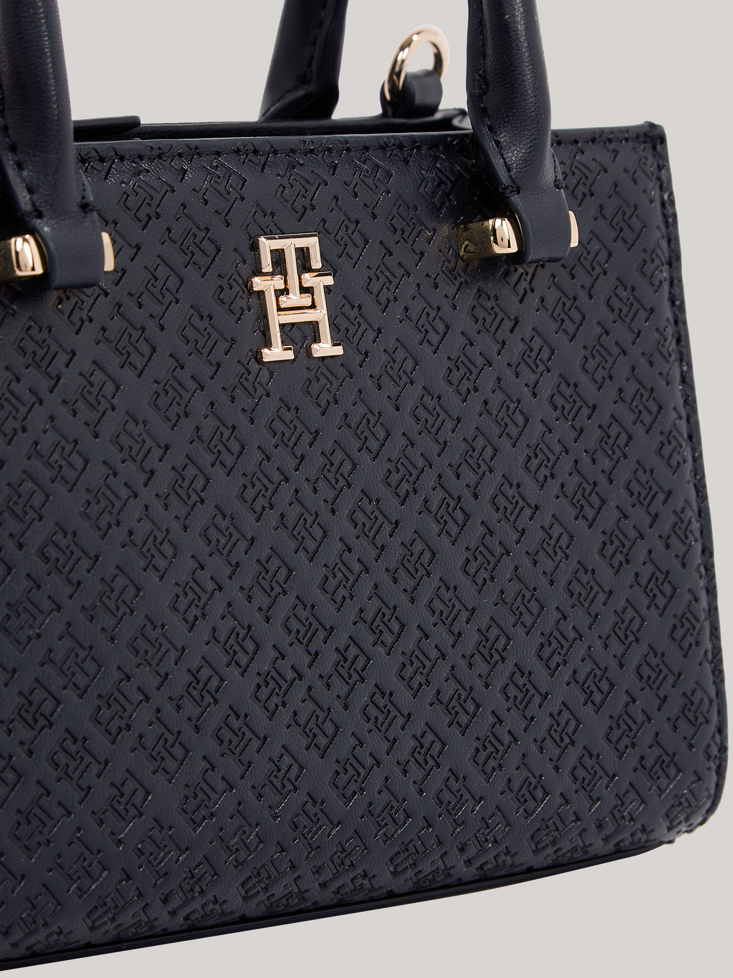 Tommy Hilfiger TH Monogram Debossed Tote – Black Faux Leather Handbag