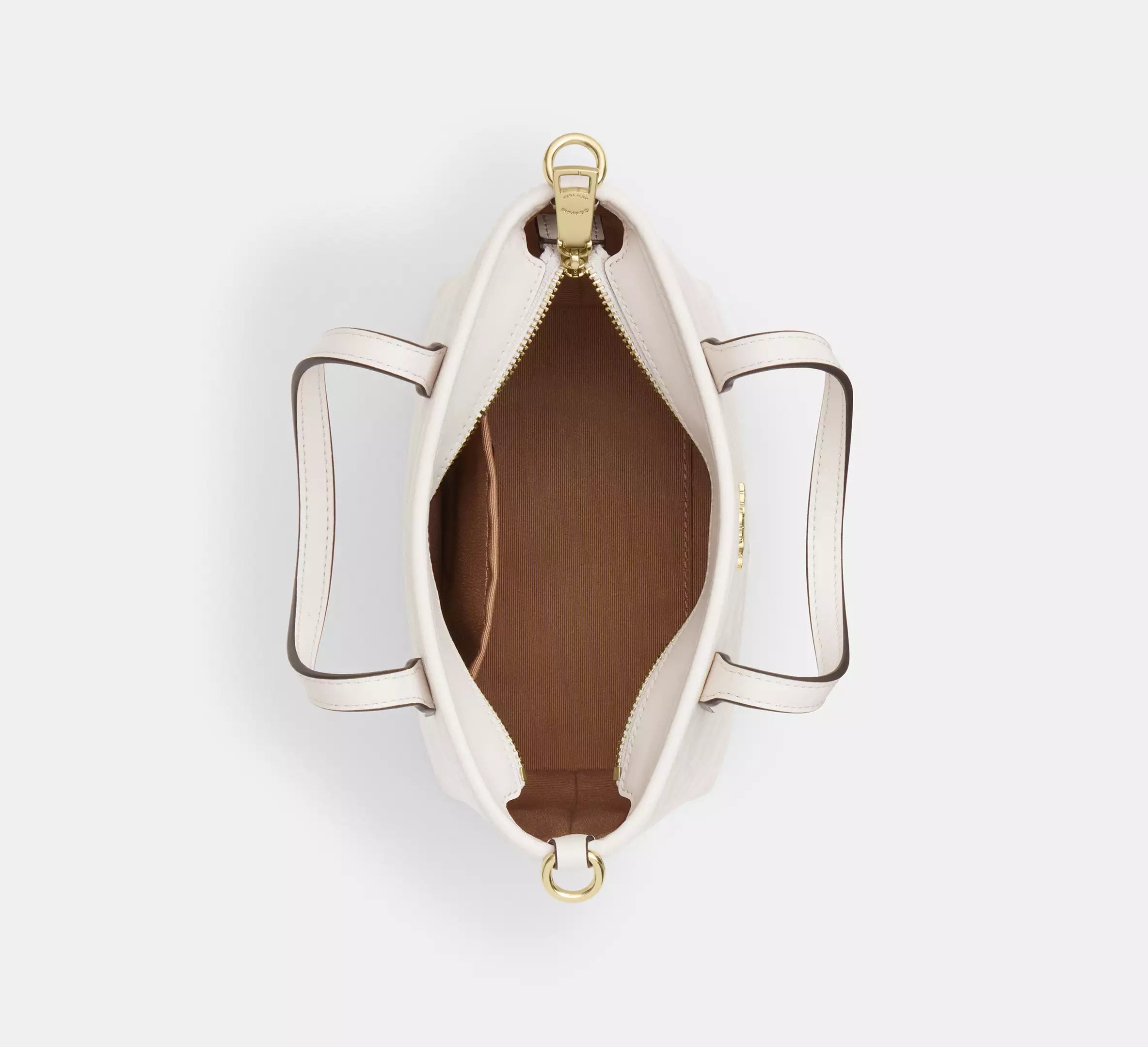 Chic, practical, and effortlessly stylish — a must-have Coach classic #42