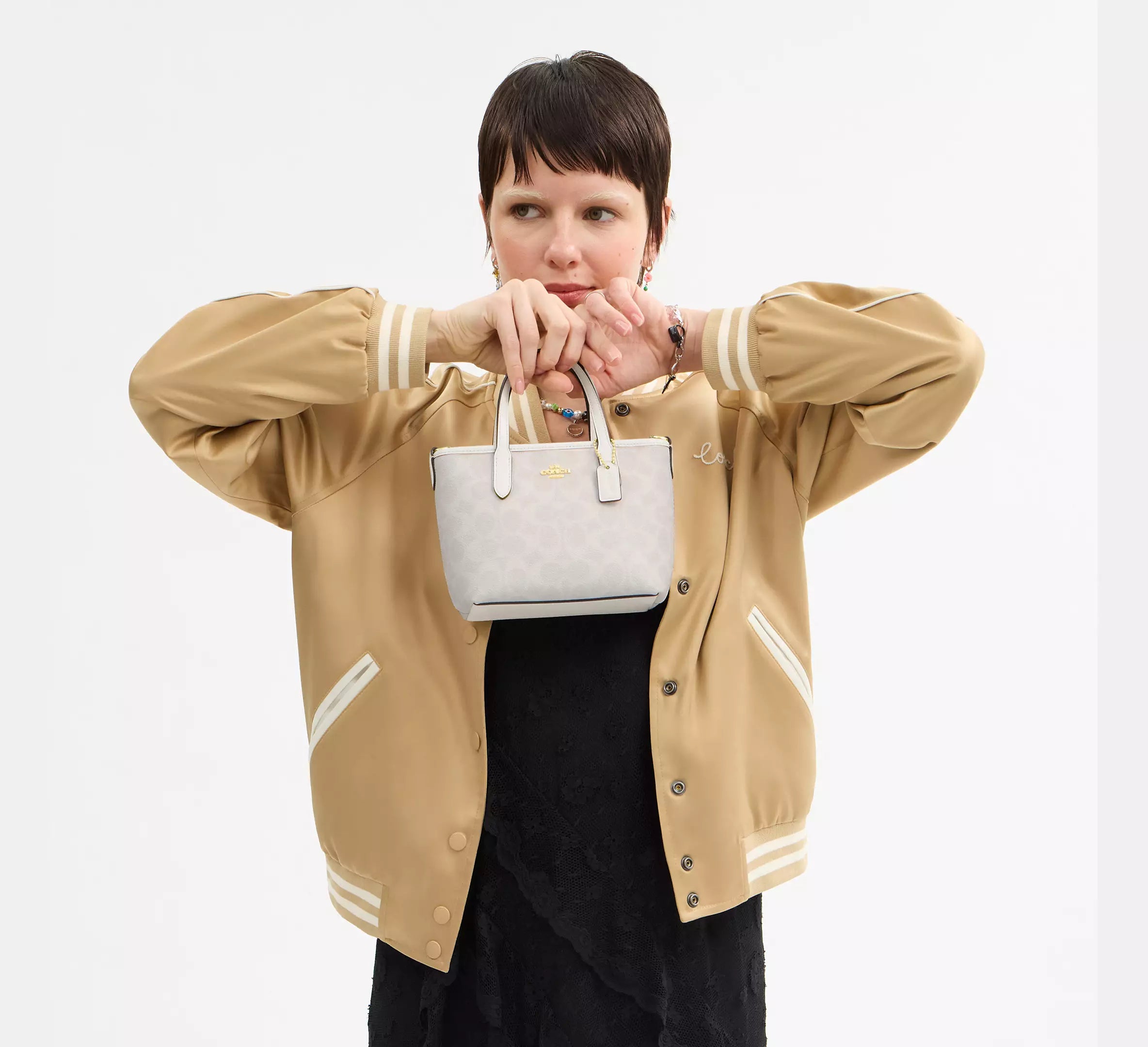 Chic, practical, and effortlessly stylish — a must-have Coach classic #42