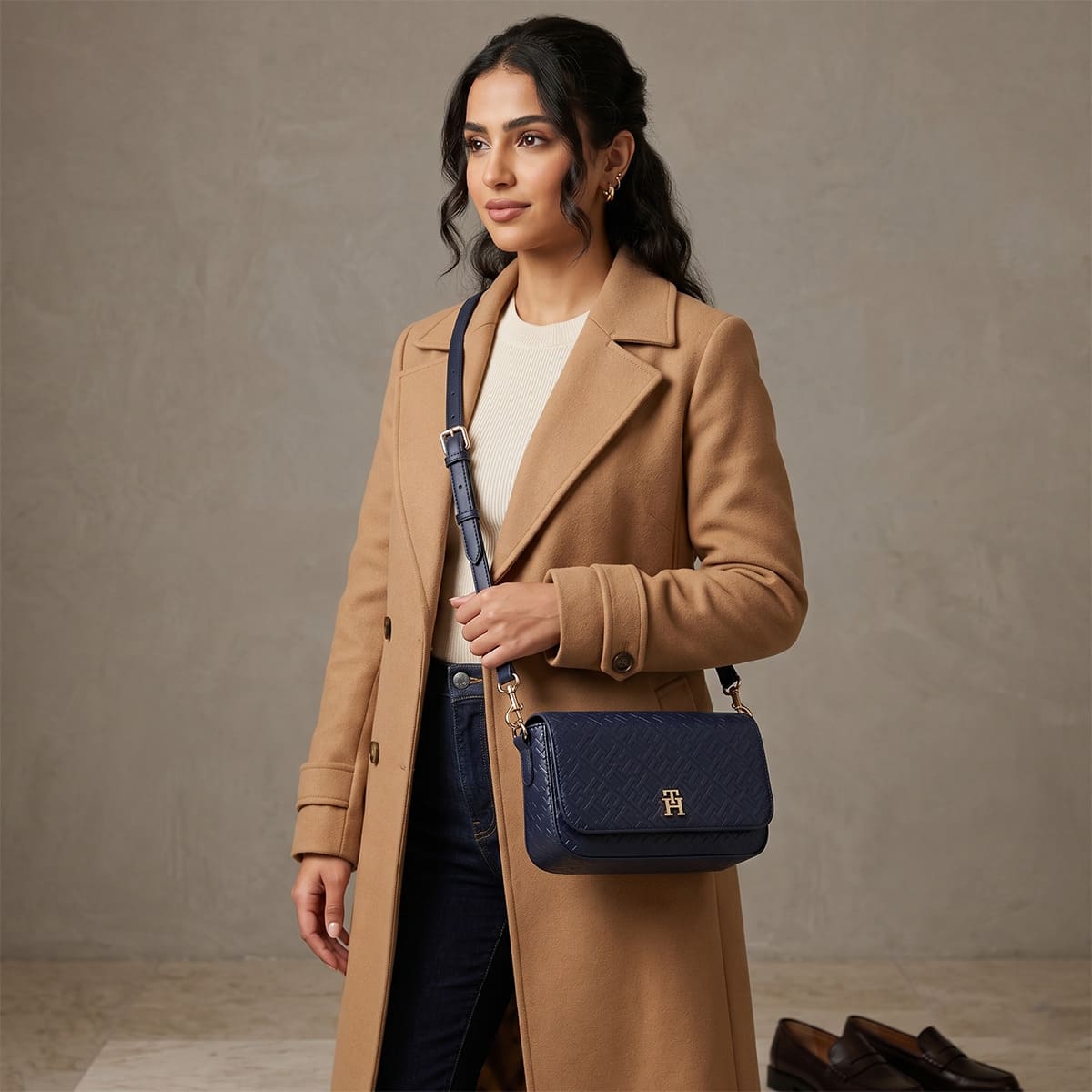 Tommy Hilfiger Women's Navy Blue Monogram Embossed Crossbody Bag with Gold Hardware